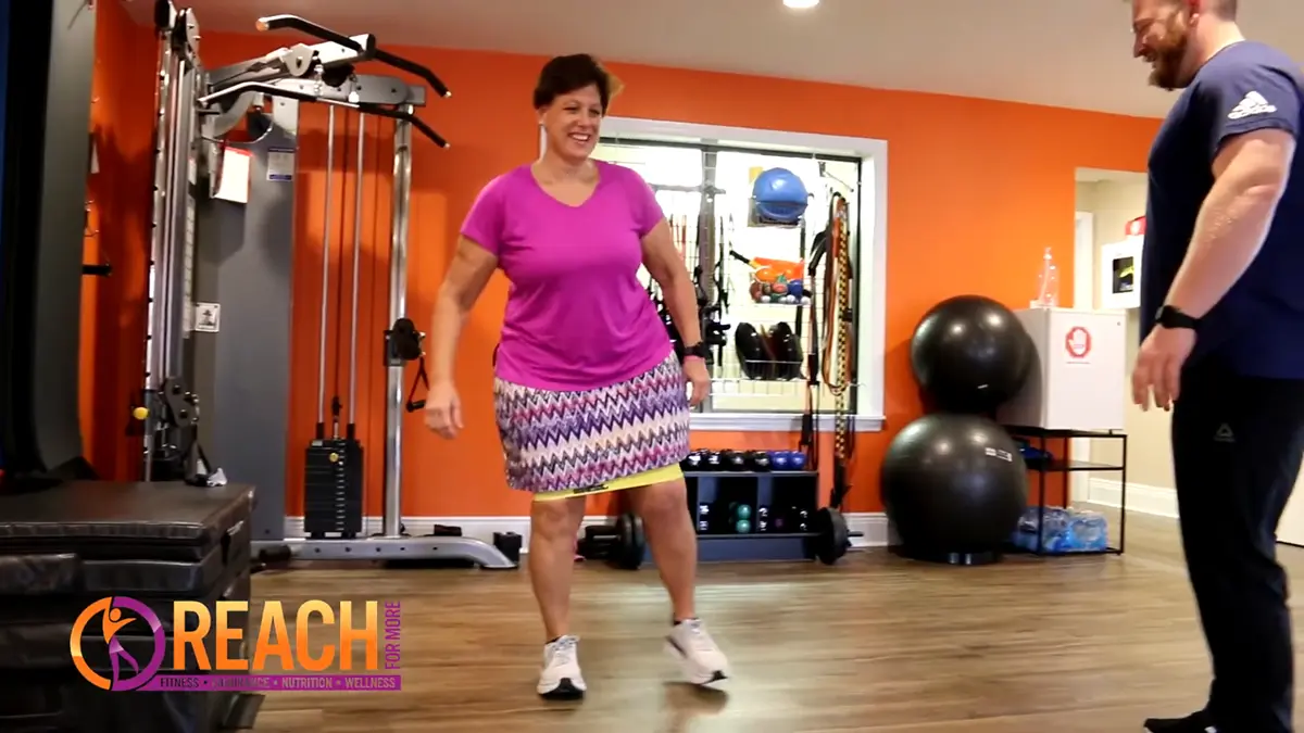 Customer at Reach For More Fitness in Camp Hill, PA, discussing their fitness and nutrition journey with personal training.